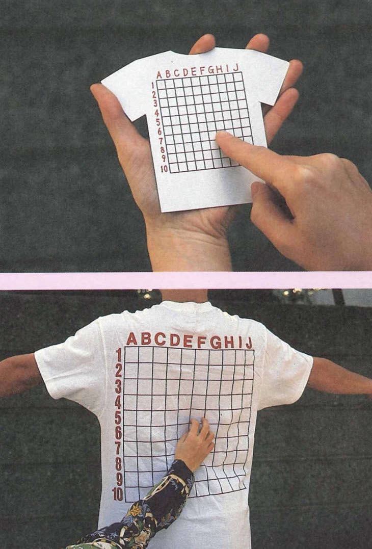 White T-shirt printed with a Battleship-style grid